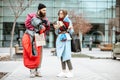 Homeless beggar talking with passing by woman Royalty Free Stock Photo