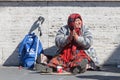 Homeless beggar. Woman asking for alms. Street. Rome Italy