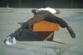 Homeless black man sleeping on a park bench, New York City, New York Royalty Free Stock Photo