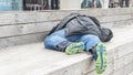 Homeless bozo sleeping on the street Royalty Free Stock Photo