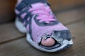 Homeless Child Wearing Old Worn Out Shoes with Holes in them Toes Sticking Out Royalty Free Stock Photo