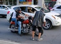 Homeless Cleaning Bikers Headlamps