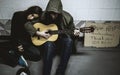 Homeless Couple Man Playing Guitar Asking For Money Donation