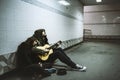 Homeless Couple Man Playing Guitar Asking For Money Donation Royalty Free Stock Photo