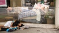 Homeless en the street of argentina. coronavirus virus. . bed shop.