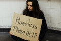 Homeless Hungry Woman Asking for Help Royalty Free Stock Photo