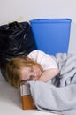 Homeless kid sleeping in a box Royalty Free Stock Photo