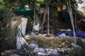 Homeless makeshift shelter or hut in a forest made with recovered material, Alicante, Spain Royalty Free Stock Photo