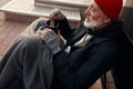 Homeless man ask for money donation, help on street Royalty Free Stock Photo