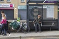 A homeless man in a bus shelter in Belfast Northern IrelandB