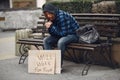 Homeless man in a durty clothes autumn city Royalty Free Stock Photo