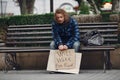 Homeless man in a durty clothes autumn city Royalty Free Stock Photo