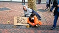 Homeless man and his dog Royalty Free Stock Photo