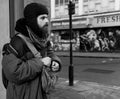 Homeless man in Manchester's Northern Quarter. Vunerable and alone as he faces another night. Royalty Free Stock Photo