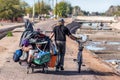 Homeless Man Pulling Cart