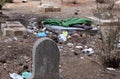 Homeless man sleeping in a grave yard