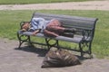 Homeless man sleeping on a park bench, Los Angeles, California Royalty Free Stock Photo