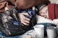 Homeless man sleeping on the street Royalty Free Stock Photo