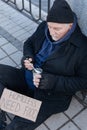 Homeless man wearing cozy cap Royalty Free Stock Photo