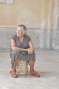 A homeless old woman asking for help Royalty Free Stock Photo