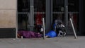 Homeless people sleeping in a shop doorway, Dublin, Ireland.