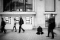 A Homeless Person Begging on the Champs Elysees Royalty Free Stock Photo