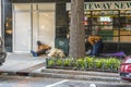 Homeless person sitting on cardboard downtown Atlanta
