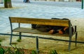 Homeless person is sleeping on a bench in the center of vienna, austria....IMAGE Royalty Free Stock Photo