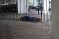 Homeless person sleeping beneath a bridge Royalty Free Stock Photo