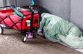 Homeless person sleeping on the street in the Hafen City quarter of Hamburg, Germany Royalty Free Stock Photo