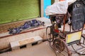 Homeless person sleeping under blanket in the street in Taj Ganj neighborhood of Agra, Uttar Pradesh, India Royalty Free Stock Photo