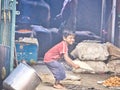 Homeless and poor child in the street. Representing the situation of children in India, who doesn`t have access to home, nutritio Royalty Free Stock Photo