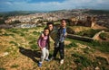 Homeless poor children in ancient Fes city ruins mountain, Fes, Morocco