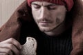 Homeless and poor man eating sandwich Royalty Free Stock Photo