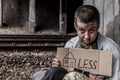 Homeless poor woman with sign Royalty Free Stock Photo