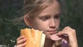 Homeless Sad Child in Abandoned House Unhappy Stray Girl Eating Bread Sausage