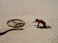 Homeless sand artist Royalty Free Stock Photo