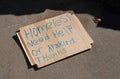 Homeless sign on cardboard