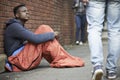 Homeless Teenage Boy Sleeping Bag On The Street Royalty Free Stock Photo