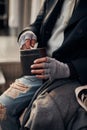 Closeup photo of beggar hands getting money Royalty Free Stock Photo