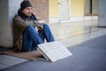 Homeless whit dirty hands drinking alone Royalty Free Stock Photo