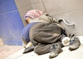 Homeless Woman on Sidewalk Royalty Free Stock Photo