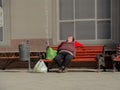 April 30, 2017, Russia, Moscow. A homeless man sleeps on a bench