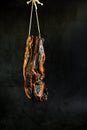 Homemad preserved meat in saya sauce hanging for drying in Asian countries