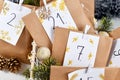 Homemade Advent calendar made from craft paper bags with handwritten numbers