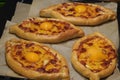 Homemade Ajarian khachapuri with cheese and egg. Handmade, cooking healthy food with your own hands at home