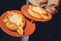 Homemade Ajarian Khachapuri with Sulguni Cheese Filled with a Raw Egg and Melted Butter Close Up. Fresh Hot Traditional