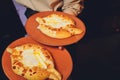 Homemade Ajarian Khachapuri with Sulguni Cheese Filled with a Raw Egg and Melted Butter Close Up. Fresh Hot Traditional