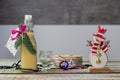 Homemade alcohol egg liquere with jar, candle and snowman decoration on wood table Royalty Free Stock Photo