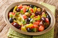 Homemade Algerian salad of tomatoes and green peppers Chlada felfel close-up on the table. horizontal Royalty Free Stock Photo